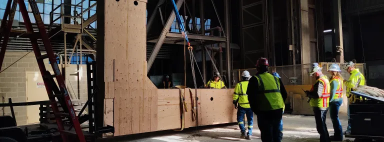 Rigging crews at SURF are doing a series of tests on a large wooden model L-beam in anticipation of lowering the real thing down the shaft to the 4850L.