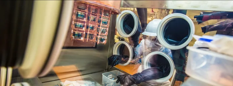 Researcher working in glove box