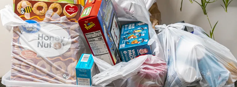 Basket full of donated food items