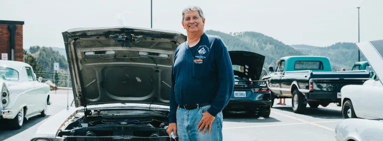 Jackson Pahl stands beside his 1968 Mustang California Special