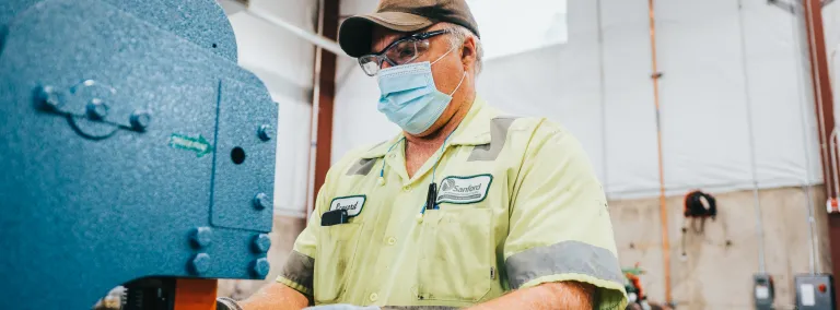 technician operates an ironworker