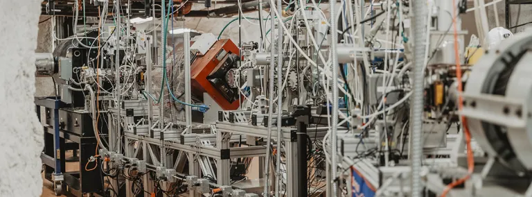 a complex particle accelerator in an underground laboratory 