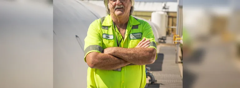 Man standing by the Wastewater Treatment Plant