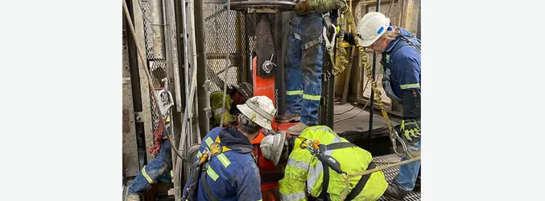 South Dakota Science and Technology Authority hoist and shaft crews safely release the twist, or stored energy, from the hoist rope in preparation of the new Ross counterweight install.