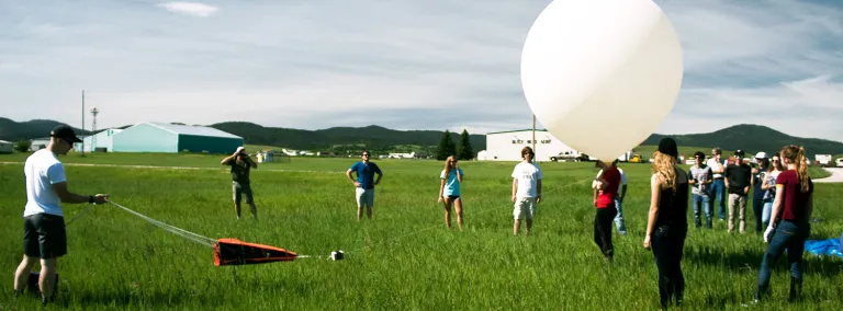 Students, educators, parent volunteers, and Davis-Bahcall scholars prepare to launch a practice NASA weather balloon in preparation for the Total Solar Eclipse 2017 event at the Black Hills Airport in Spearfish, S. Dakota on June 9, 2017.