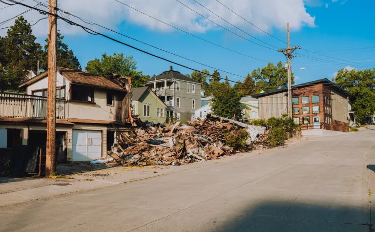 The remnants of a burned and demolished apartment building