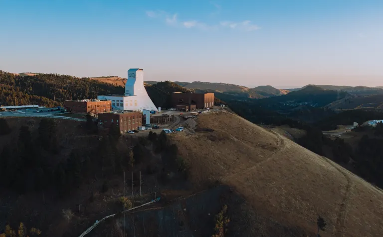 The Yates Campus as photographed from the sky. The Yates Headframe stands above other campus buildings. 