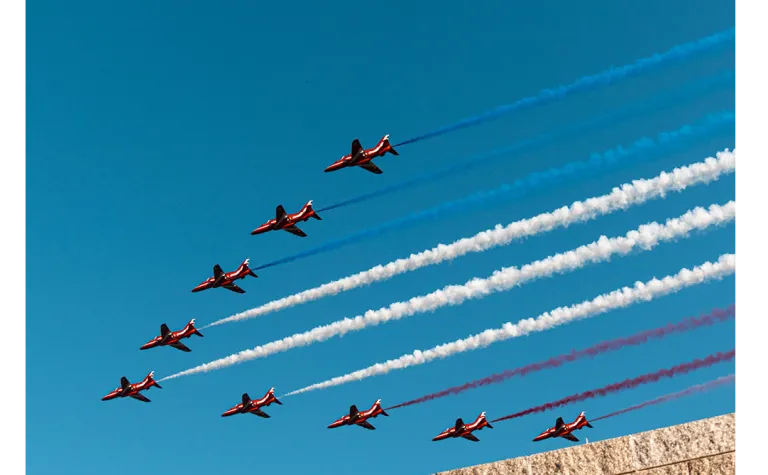 Royal Air Force Red Arrows performed a flyover 