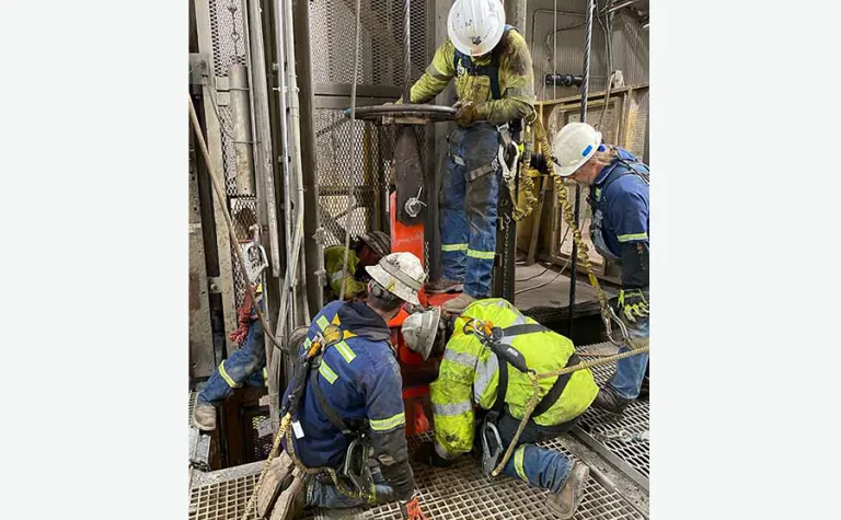 South Dakota Science and Technology Authority hoist and shaft crews safely release the twist, or stored energy, from the hoist rope in preparation of the new Ross counterweight install.