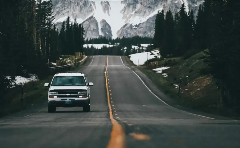 road with mountains in the background