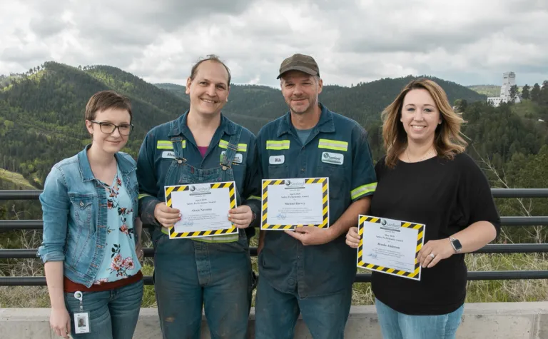 Amelia Pearson, receptionist and safety committee co-chair; Alexis Novotny, infrastructure technician; Michael Harvey, infrastructure technician; and Brooke Anderson, technical coordinator support for facility infrastructure.