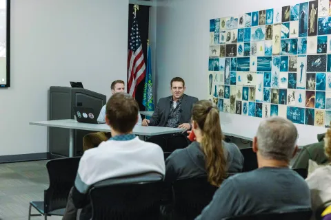 People attending an event a the visitor center.