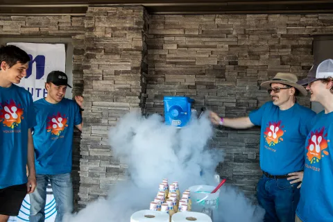 Liquid nitrogen icream being made by volunteers. 