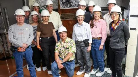 Members of the Davis family and APS surround the plaque designating SURF an APS Historic Physics Site. 