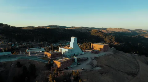 a drone photograph of the Yates Headframe and surrounding buildings 