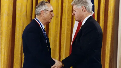 John Bahcall and President Bill Clinton at the White House