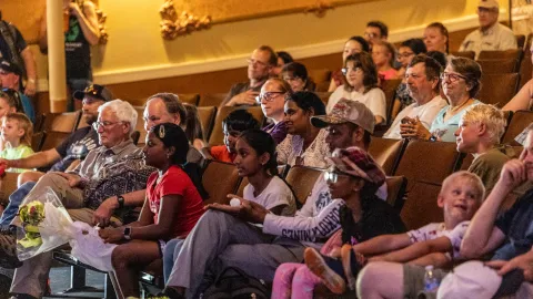 The crowd in the Homestake Opera House enjying the performance and lecutrues at Neutrino Day 2024